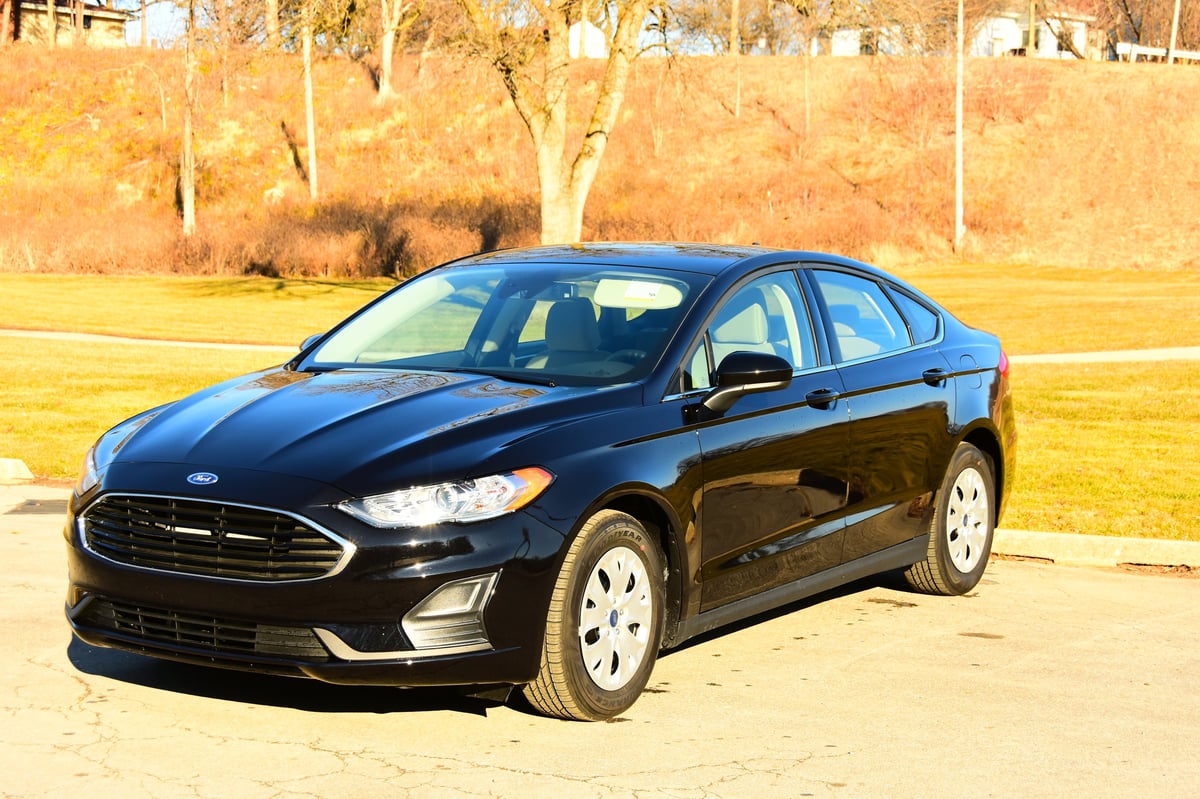 Black Ford Fusion sedan